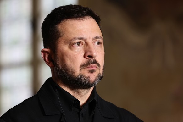 Ukrainian President Volodymyr Zelensky addresses a press conference after the Coalition of the Willing summit on security guarantees for Ukraine in Paris, Monday, July 13, 2026. (Teresa Suarez/Pool Ph ...