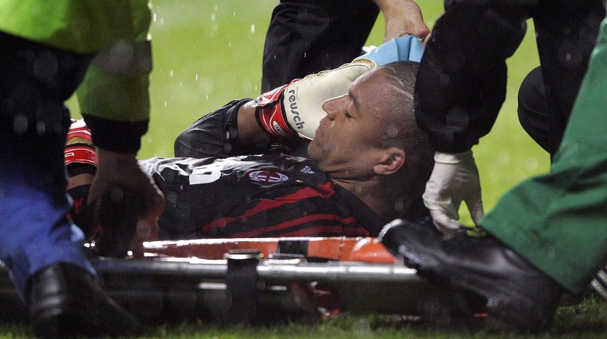 AC Milan's goalkeeper Nelson Dida on the ground injured during their Champions League Group D soccer match against Celtic at Celtic Park, Glasgow, Scotland, Wednesday, Oct. 3, 2007. Celtic won 2- ...