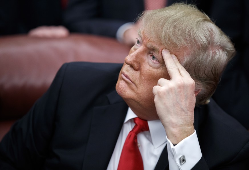 epa07243996 US President Donald J. Trump participates in a signing ceremony for the &quot;First Step ActÓ and the ÒJuvenile Justice Reform ActÓ in the Oval Office at the White House in Washington, DC, ...