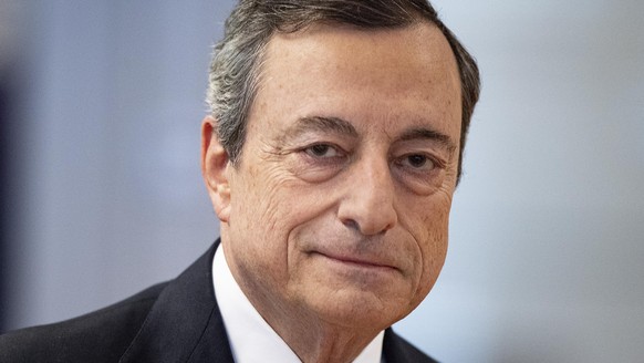 FILE - In this Thursday, July 25, 2019 file photo, President of European Central Bank Mario Draghi comes to a press conference following a meeting of the governing council in Frankfurt, Germany. The E ...