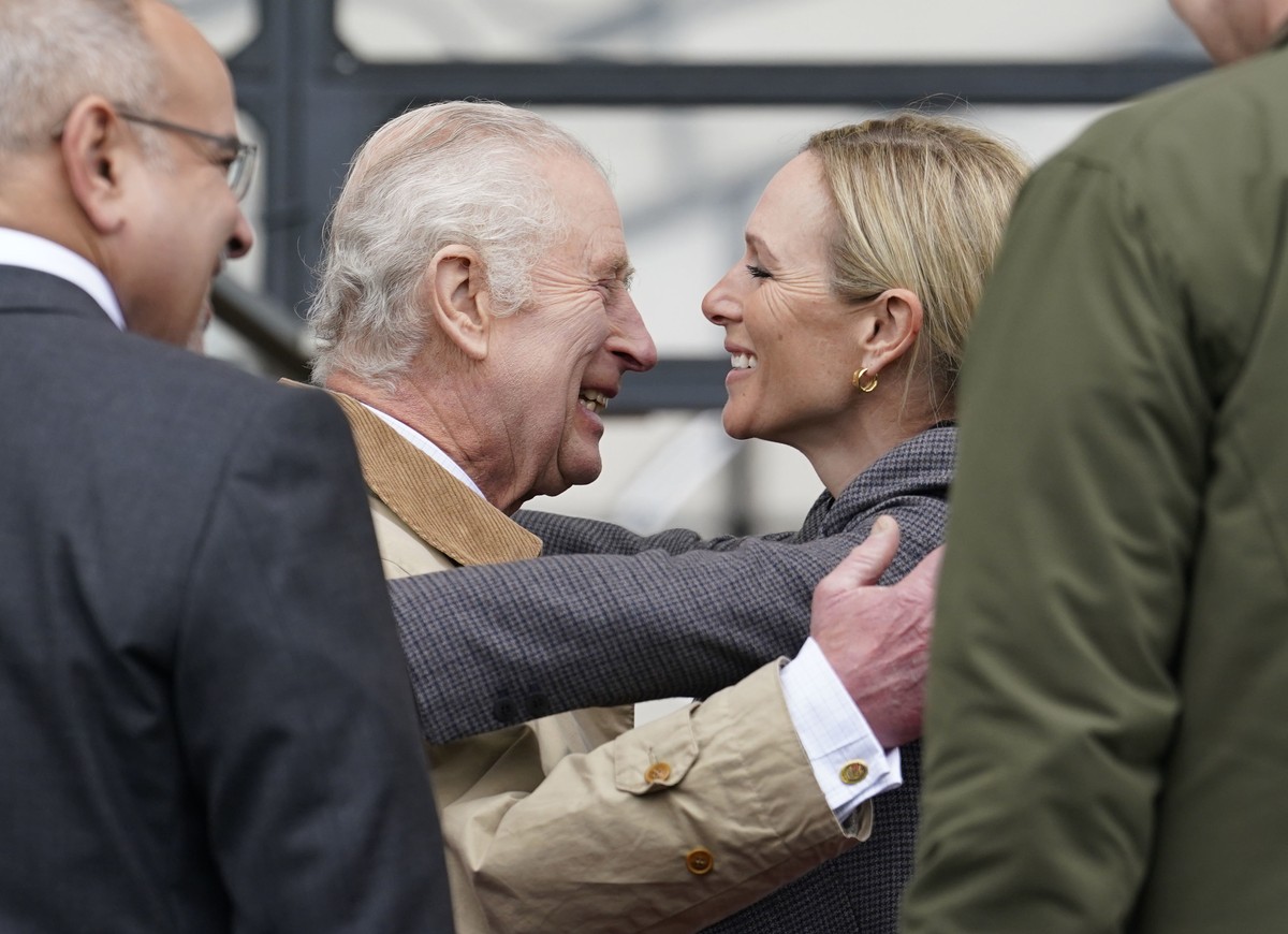 Britain's King Charles III hugs his niece, Zara Tindall at the Royal Windsor Horse Show in Windsor, England, Friday May 3, 2024. (Andrew Matthews/PA via AP)