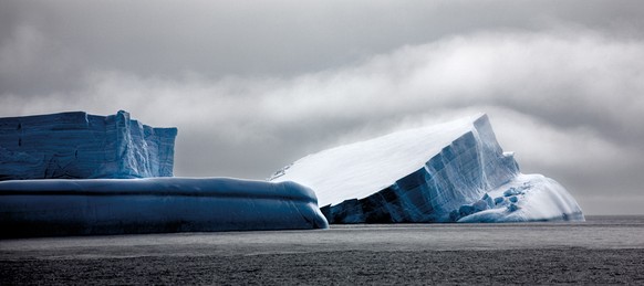 IC BY CAMILLE SEAMAN / CATERS NEWS (PICTURED: Image from Camille Seamans new book, Melting Away) - These are the stunning images of some of the polar ice caps most endangered regions. Camille Seamans  ...