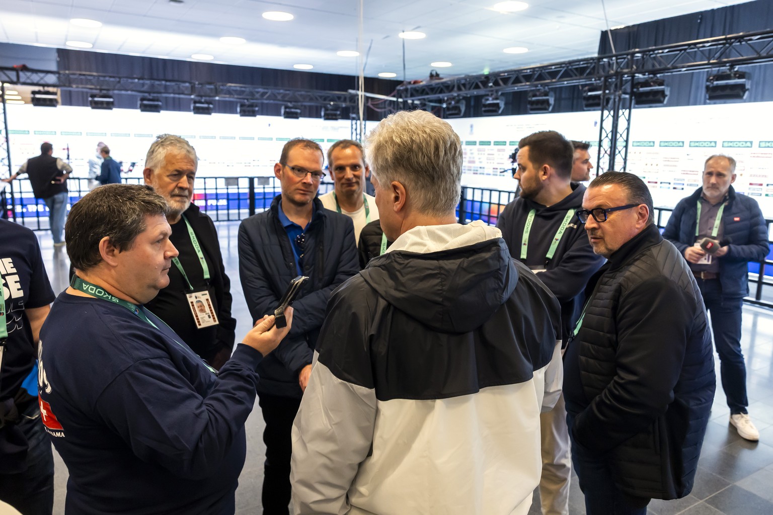Roger Bader, head coach of Austria national ice hockey team, speaks with to media in the mixed zone one day before the IIHF 2025 World Championship quarter final game against Switzerland, at the Jyske ...