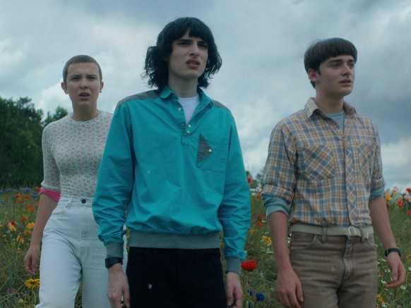 STRANGER THINGS. (L to R) Millie Bobby Brown as Eleven, Finn Wolfhard as Mike Wheeler and Noah Schnapp as Will Byers in STRANGER THINGS. Cr. Courtesy of Netflix © 2022