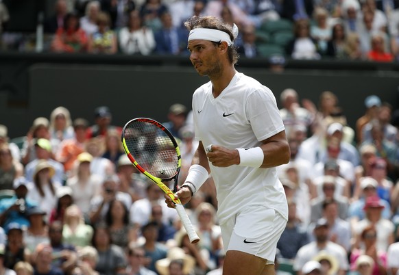 Spain&#039;s Rafael Nadal celebrates after winning a point against Portugal&#039;s Joao Sousa in a Men&#039;s singles match during day seven of the Wimbledon Tennis Championships in London, Monday, Ju ...