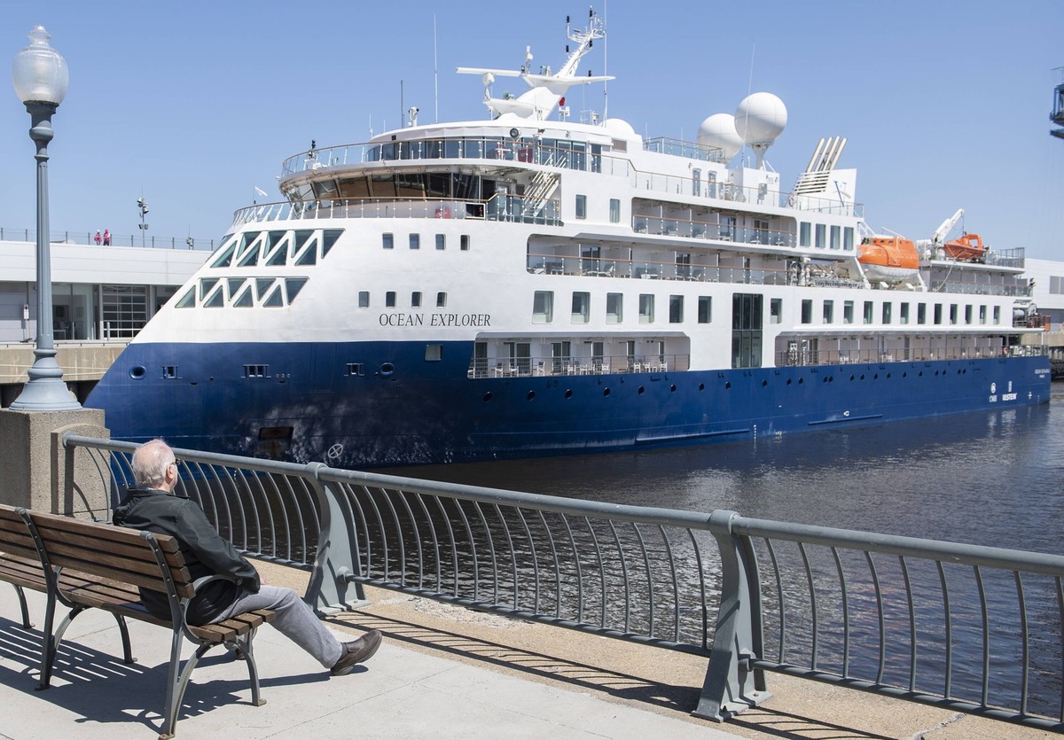 May 8, 2022, Montreal, PQ, Canada: A man looks out at the Ocean Explorer cruise ship in the Port of Montreal, Sunday, May 8, 2022. The Explorer is the second cruise ship to arrive in the port since th ...