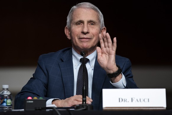 epa09679126 Dr. Anthony Fauci, White House Chief Medical Advisor and Director of the NIAID, responds to questions from Sen. Rand Paul (R-Ky.) during a Senate Health, Education, Labor, and Pensions Committee hearing to examine the federal response to COVID-19 and new emerging variants on Capitol Hill in Washington, DC, USA, 11 January 2022.  EPA/Greg Nash / POOL