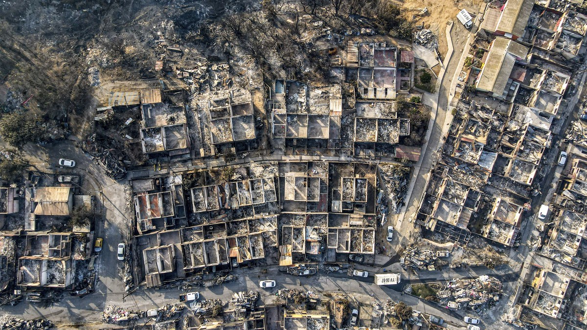 A view of homes burnt during forest fires that blazed through the El Olivar neighborhood in Vina del Mar, Chile, on Monday, Feb. 5, 2024. Areas around Vina del Mar have been among the hardest-hit by f ...