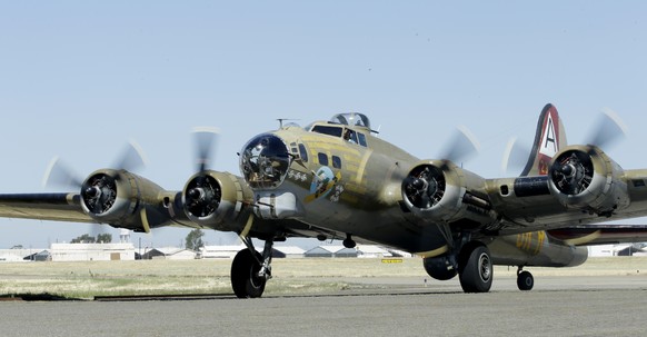 In this photo taken June 2, 2018 photo, the Nine-O-Nine, a Collings Foundation B-17 Flying Fortress taxis after landing at McClellan Airport in Sacramento, Calif. A B-17 vintage World War II-era bombe ...