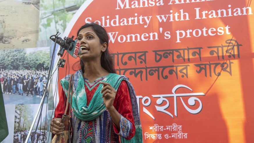 epa10245067 A Bangladeshi social activist speaks during a demonstration in solidarity with Iranian women's protests following the death of Mahsa Amini, in Dhaka, Bangladesh, 15 October 2022. Amin ...