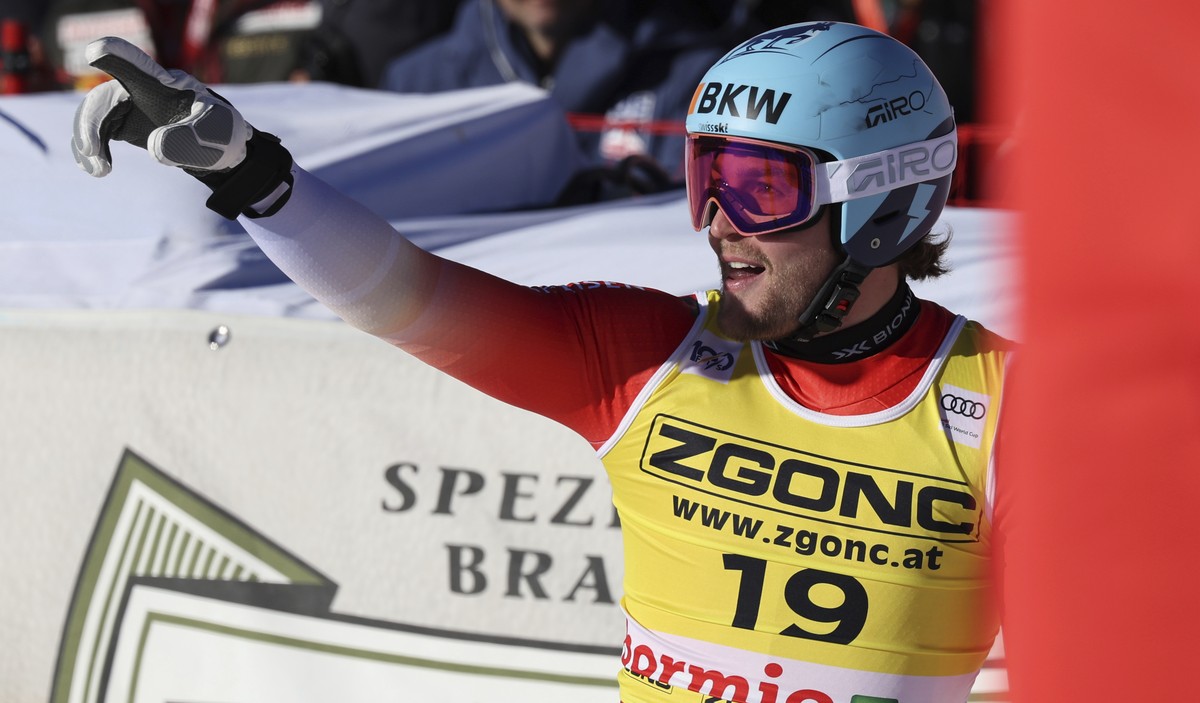 Switzerland's Alexis Monney reacts after completing an alpine ski, men's World Cup downhill race, in Bormio, Italy, Saturday, Dec. 28, 2024. (AP Photo/Marco Trovati)