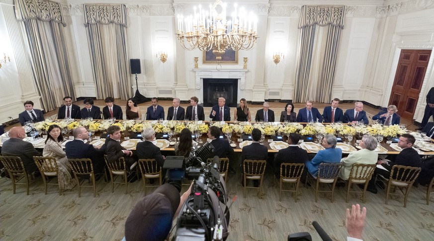 President Donald Trump points to a reporter to ask a question question during a dinner in the State Dinning Room of the White House, Thursday, Sept. 4, 2025, in Washington. (AP Photo/Alex Brandon)
Don ...