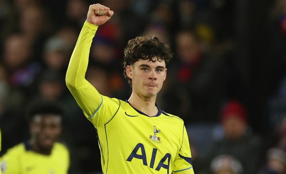 Tottenham's Archie Gray, right, celebrates after scoring the opening goal during the English Premier League soccer match between Crystal Palace and Tottenham Hotspur in London, Sunday, Dec. 28, 2 ...
