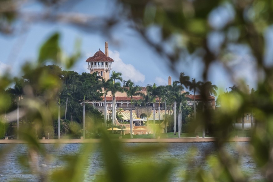 FILE - This Nov. 23, 2018 file photo shows President Donald Trump&#039;s Mar-a-Lago estate behind mangrove trees in Palm Beach, Fla. On Saturday, March 30, 2019, a woman carrying two Chinese passports ...