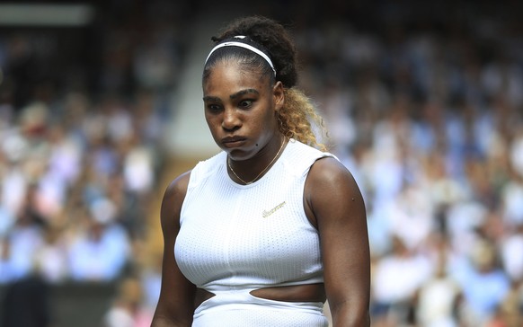 United States&#039; Serena Williams walks back to her seat as she plays Czech Republic&#039;s Barbora Strycova in a Women&#039;s semifinal singles match on day ten of the Wimbledon Tennis Championship ...