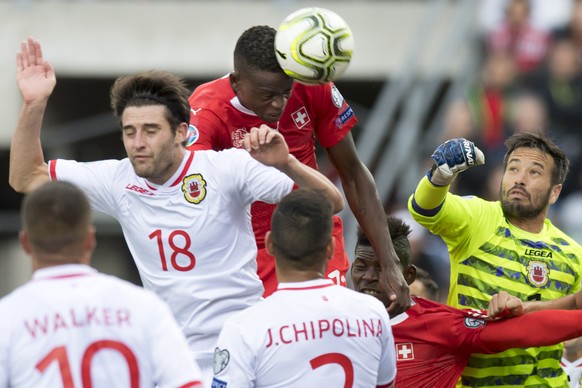 Switzerland&#039;s midfielder Denis Zakaria, second from left, scores the first goal in front of, from left, Gibraltar&#039;s midfielder Anthony Hernandez, Switzerland&#039;s forward Breel Embolo and  ...