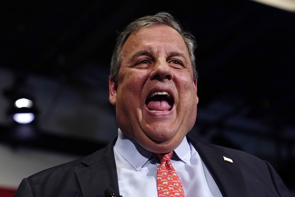 Republican Presidential candidate former, New Jersey Gov. Chris Christie laughs during a gathering, Tuesday, June 6, 2023, in Manchester, N.H. Christie filed paperwork Tuesday formally launching his b ...