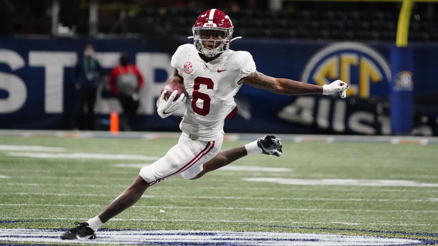 FILE - In this Saturday, Dec. 19, 2020, file photo, Alabama wide receiver DeVonta Smith (6) runs against Florida during the first half of the Southeastern Conference championship NCAA college football ...