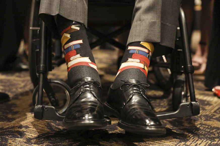 This Saturday, April 21, 2018, photo provided by the Office of former U.S. President George H.W. Bush shows Bush&#039;s socks during the funeral service for his wife, Barbara Bush, in Houston. Barbara ...