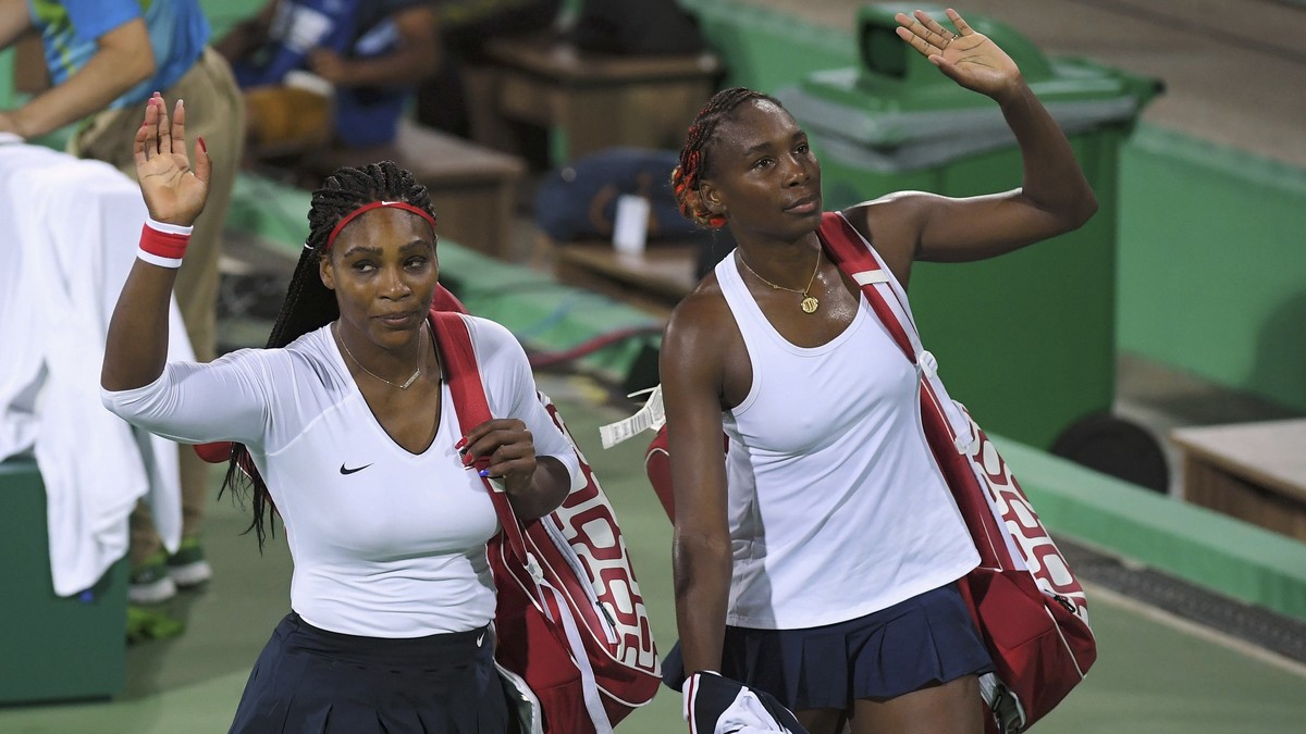 2016 Rio Olympics - Tennis - Preliminary - Women's Doubles First Round - Olympic Tennis Centre - Rio de Janeiro, Brazil - 07/08/2016. Serena Williams (USA) of USA and Venus Williams (USA) of USA  ...