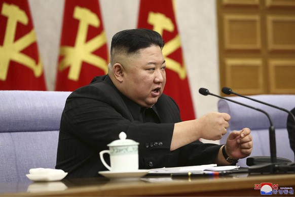 In this photo provided by the North Korean government, North Korean leader Kim Jong Un attends at a meeting of Central Committee of Worker