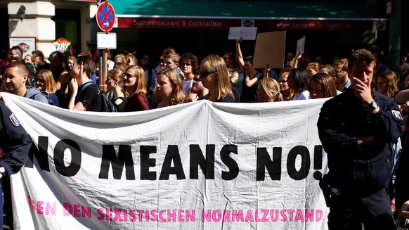 Supporters of German model and reality-TV star Gina-Lisa Lohfink protest in front of the court in Berlin, Germany, June 27, 2016. REUTERS/Hannibal Hanschke