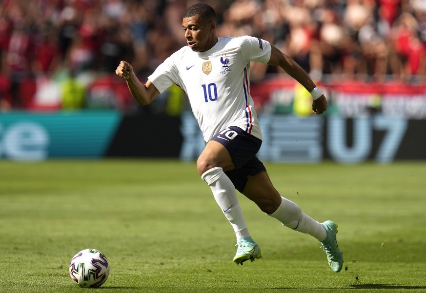 epa09285637 Kylian Mbappe of France in action during the UEFA EURO 2020 group F preliminary round soccer match between Hungary and France in Budapest, Hungary, 19 June 2021. EPA/Darko Bandic / POOL (R ...