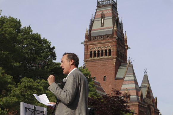 Ryan Enos, a government professor at Harvard University, speaks at a protest against President Donald Trump&#039;s recent sanctions against Harvard in front of Science Center Plaza on Tuesday, May 27, ...