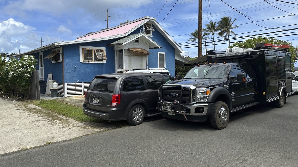 Investigator vehicles parked outside the Kaaawa, Hawaii home of Ryan Routh, the man accused of an apparent attempt to assassinate Donald Trump, on Tuesday, Sept. 17, 2024, while FBI agents conduct a s ...