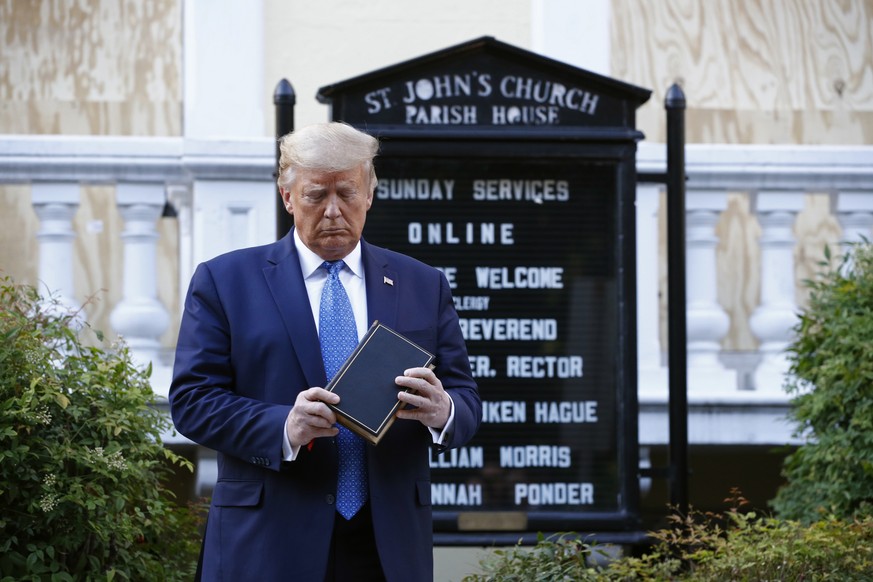 FILE - In this Monday, June 1, 2020 file photo, President Donald Trump holds a Bible during a visit outside St. John&#039;s Church across Lafayette Park from the White House in Washington. Trump built ...
