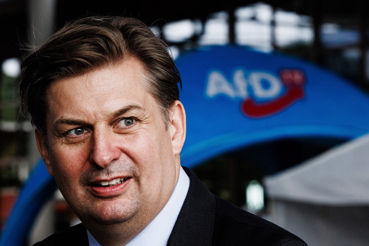 epa10774074 Alternative for Germany party (AfD) board member Maximilian Krah looks on as he is interviewed by journalists during the AfD party convention in Magdeburg, Germany, 28 July 2023. The Alter ...
