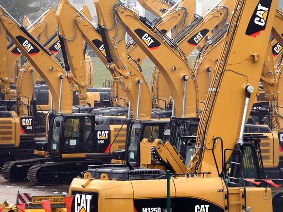 FILE - This Thursday, Feb. 28, 2013, file photo shows a parking lot at Caterpillar Belgium, in Gosselies, Belgium. Caterpillar Inc. reports quarterly financial results before the market opens on Monda ...
