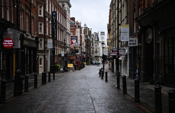 epa09016477 Deserted streets around Soho in London, Britain, 16 February 2021. The UK government is preparing to announce the lifting of third UK lockdown. British Prime Minister Boris Johnson is set  ...