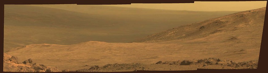 A view from NASA&#039;s Mars Exploration Rover Opportunity shows part of &quot;Marathon Valley,&quot; a destination on the western rim of Endeavour Crater on the planet Mars, as seen from an overlook  ...