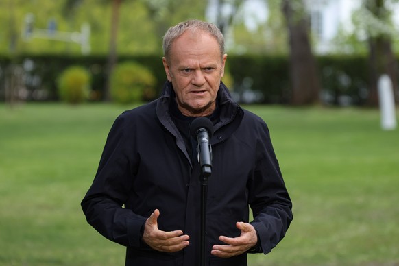 epa12919448 Prime Minister Donald Tusk speaks during a press conference in the gardens of the Chancellery of the Prime Minister in Warsaw, Poland, 28 April 2026. The meeting focused on the release of  ...