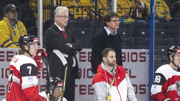 220514 Head coach Roger Bader and assistant coach Arno Del Curto of Austria during the 2022 IIHF Ice hockey, Eishockey World Championship, WM, Weltmeisterschaft game between Sweden and Austria on May  ...