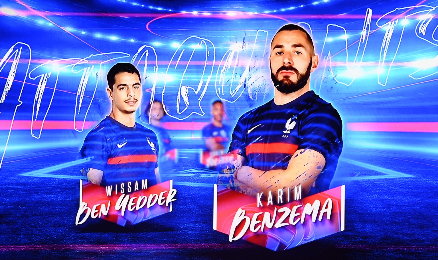 epa09209719 The portraits of France&#039;s forward Karim Benzema (R) and France&#039;s forward Wissam Ben Yedder are displayed on the screen as France&#039;s head coach Didier Deschamps (unseen) annou ...