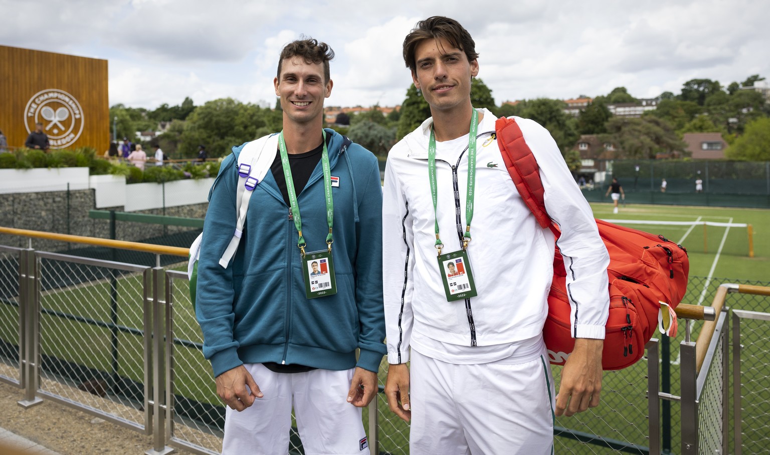 Switzerland&#039;s Marc-Andrea Huesler, right, and Alexander Ritschard pose prior to a training session at the All England Lawn Tennis Championships in Wimbledon, London, Saturday, June 25, 2022. The  ...