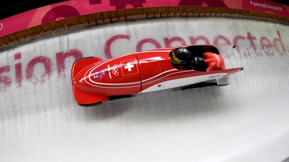 epa06546101 Sabina Hafner and Rahel Rebsamen of Switzerland in action during the Women's Bobsleigh competition at the Olympic Sliding Centre during the PyeongChang 2018 Olympic Games, South Korea, 20 February 2018.  EPA/VASSIL DONEV