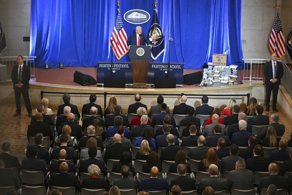 President Donald Trump speaks at the Justice Department in Washington, Friday, March 14, 2025. (Pool via AP)
Trump Justice