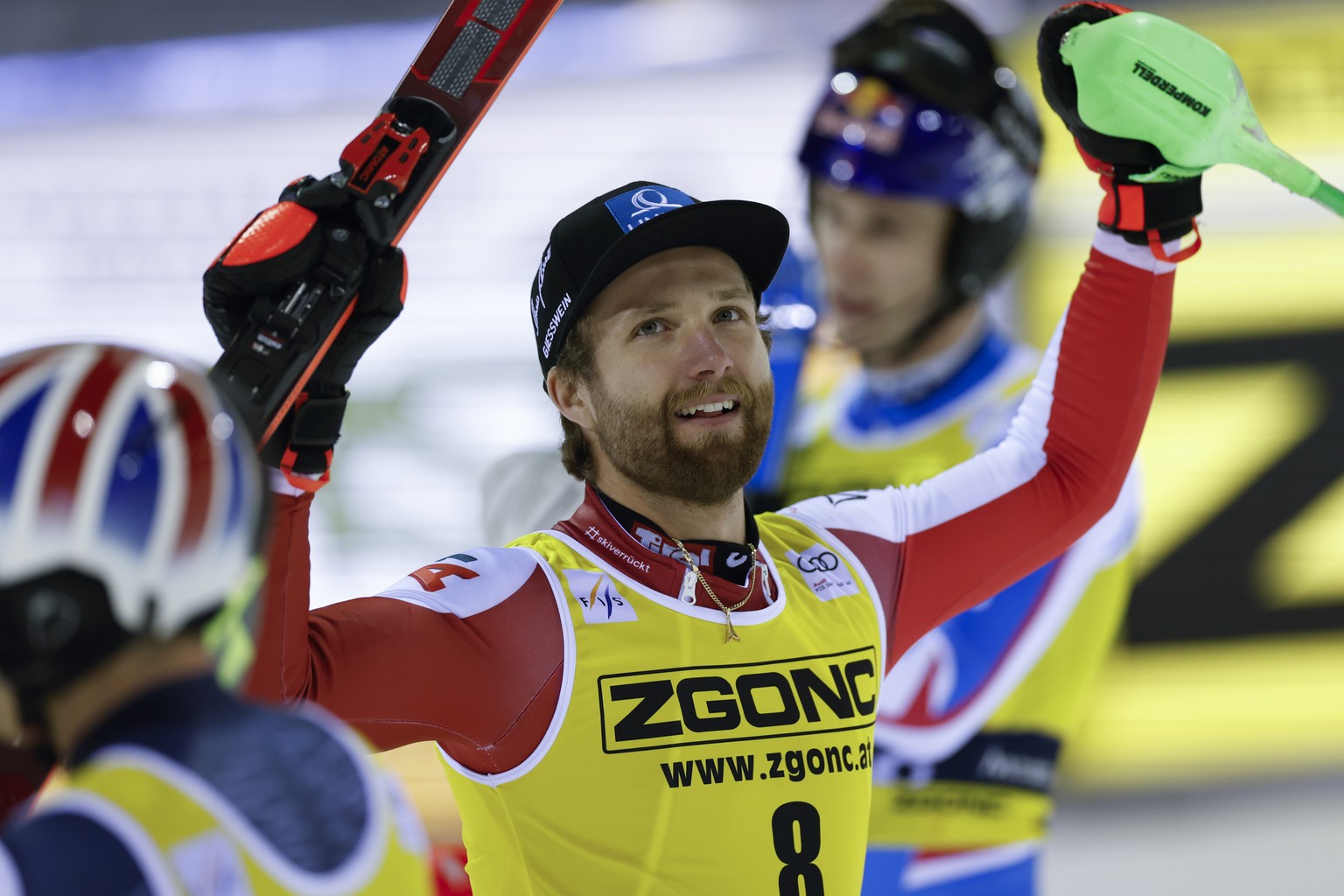 Austria's Marco Schwarz celebrates winning an alpine ski, men's World Cup slalom, in Madonna di Campiglio, Italy, Friday, Dec. 22, 2023. (AP Photo/Alessandro Trovati)