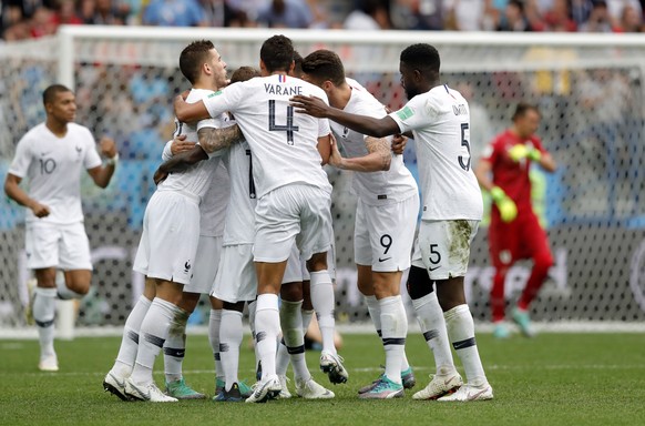 France&#039;s Antoine Griezmann celebrates with teammates after scoring his side&#039;s second goal during the quarterfinal match between Uruguay and France at the 2018 soccer World Cup in the Nizhny  ...