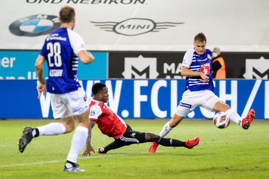 Luis Sinisterra (C) of Feyenoord Rotterdam scores his team&#039;s 3rd goal under a challenge by Holger Badstuber (L) and Marco Burch (R) of FC Luzern during the UEFA Europa Conference League third qua ...