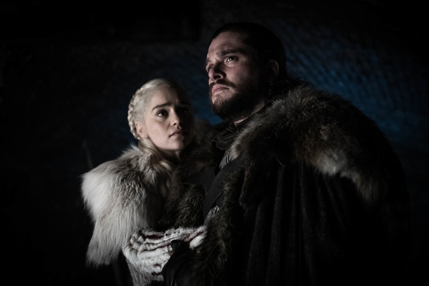 This image released by HBO shows Emilia Clarke and Kit Harington in a scene from &quot;Game of Thrones,&quot; that aired Sunday, April 21, 2019. With the Game of Thrones' Jon Snow revealing his royal  ...