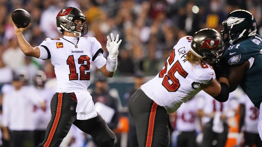 Tampa Bay Buccaneers quarterback Tom Brady (12) looks to pass during the first half of an NFL football game against the Philadelphia Eagles on Thursday, Oct. 14, 2021, in Philadelphia. (AP Photo/Matt  ...