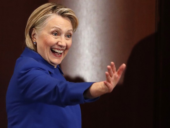 FILE - In this Monday, Jan. 7, 2019, file photo, former Secretary of State Hillary Clinton waves to well-wishers following an appearance at Barnard College with New York Gov. Andrew Cuomo, in New York ...