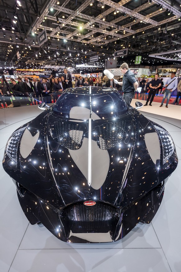 epa07415470 The new Bugatti La voiture Noire is presented during the first media day at the 89th Geneva International Motor Show in Geneva, Switzerland, 05 March 2019. The Motor Show will open its gat ...