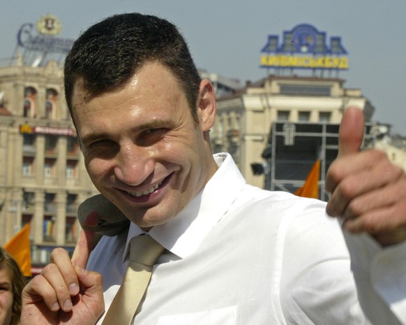 Vitali Klitschko, Ukrainian-born WBC heavyweight champion, smiles at Independence square in Ukraine&#039;s capital Kiev Wednesday, Aug. 24, 2005. Klitschko arrived in his native Ukraine to mark the 14 ...