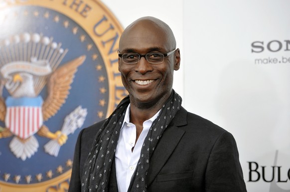 FILE - Actor Lance Reddick appears at the &quot;White House Down&quot; premiere in New York on June 25, 2013. Reddick, a character actor who specialized in intense, icy and possibly sinister authority ...