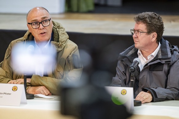 epa12141608 Swiss Federal Councillor Martin Pfister (L) and Swiss Federal Councillor Albert Roesti (R) speak during a press conference in Ferden, Switzerland, 28 May 2025. A large part of Blatten vill ...